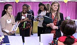 2012 college grads enter improving job market