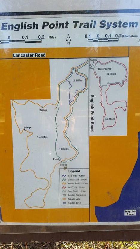 <p>A view of the trail sign at the English Point recreation area near Hayden Lake.</p>