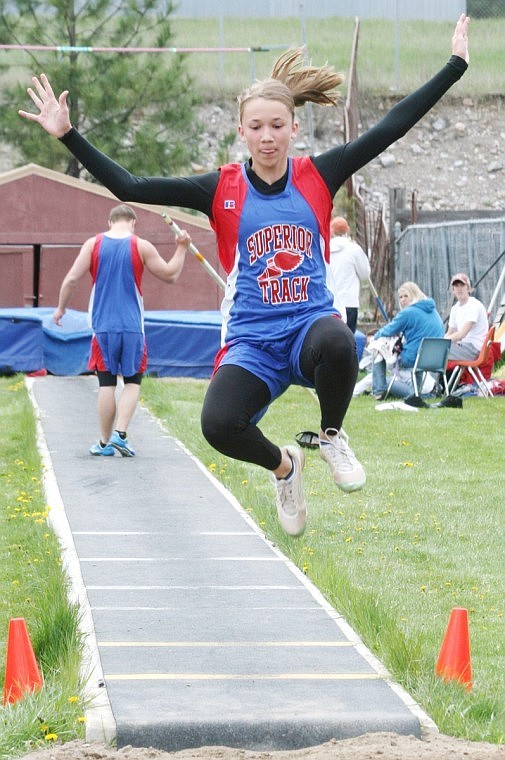 Nicole Stroot takes a leap in the long jump event.