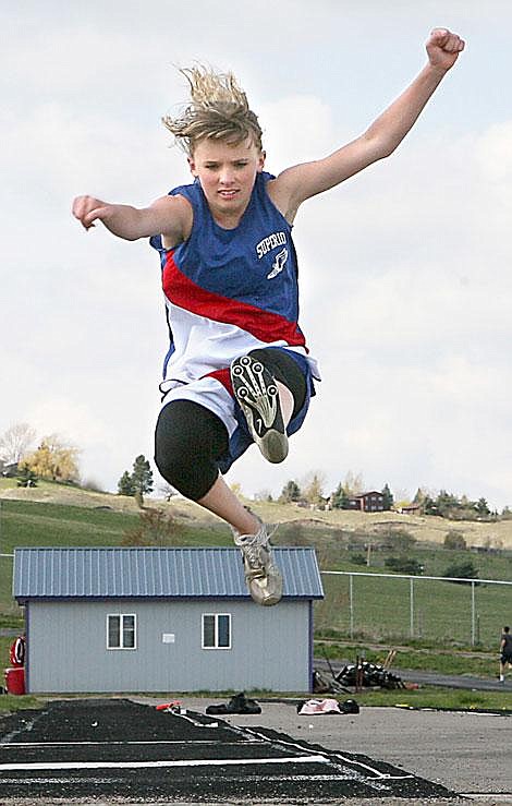 Photo by Ali Bronsdon Superior's Haley Jacobson leaps into the finals at the District 14 C track meet on Thursday morning in Polson.