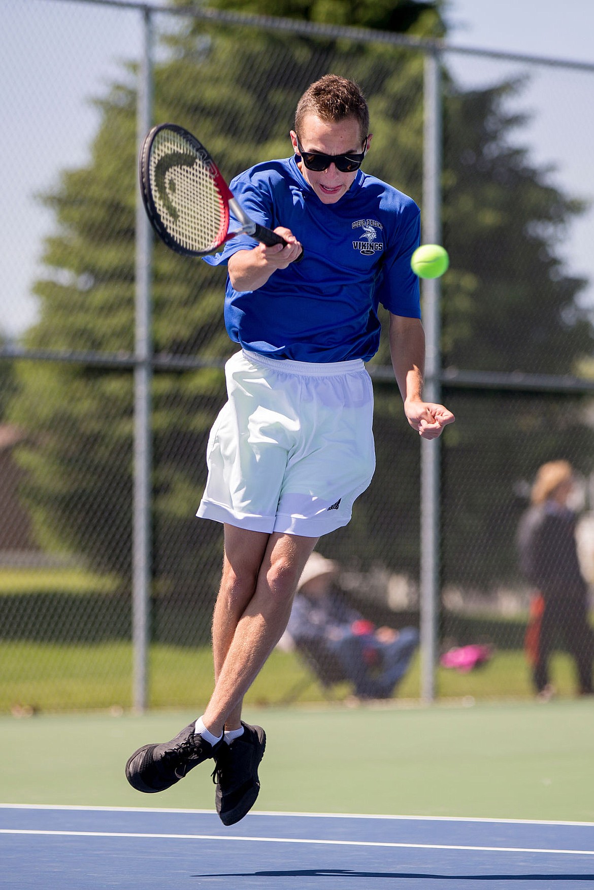 &lt;p&gt;JAKE PARRISH/Press Coeur d'Alene's Jake Kraft completes a forehand return from a serve by Gavin Hewett of Lewiston on Friday at the 5A Region 1 tournament at Lake City High School.&lt;/p&gt;