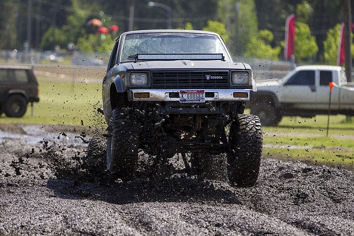 &lt;p&gt;JAKE PARRISH/Press A truck from the Gator Boyz group plows through a mud pit on Saturday while performing a show at the Northwest Spring Fest at the Kootenai County Fairgrounds.&lt;/p&gt;