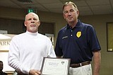 Man honored for helping police