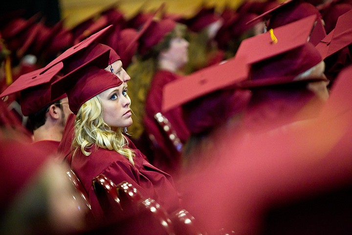 &lt;p&gt;Whitney L. Hurt glances toward the upper level seating in Christianson Gymnasium prior to receiving her diploma along with hundreds of others during the North Idaho College graduation ceremony in Coeur d'Alene.&lt;/p&gt;
