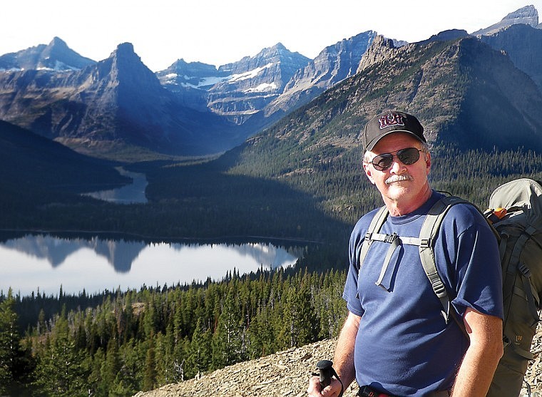 Jack Potter hikes in October 2010 above Cosley Lake in the Belly River area of Glacier National Park. Potter has retired after 41 years in the park, but plans to continue volunteer work in Glacier.