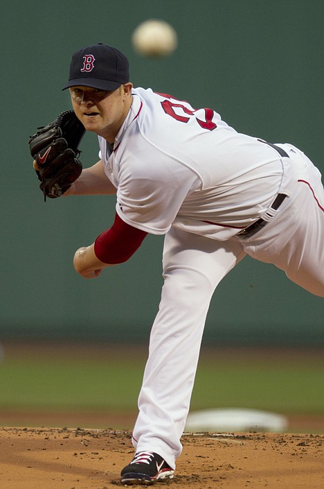 &lt;p&gt;Boston Red Sox's Jon Lester delivers a pitch against the Seattle Mariners in the first inning of a baseball game at Fenway Park, in Boston, Monday, May 14, 2012. (AP Photo/Steven Senne)&lt;/p&gt;