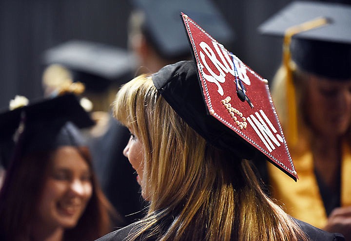 &lt;p class=&quot;p1&quot;&gt;&lt;strong&gt;Ashlee Nickerson&lt;/strong&gt; lines up for the procession at the FVCC graduation. Her cap reads &#147;Scrub In&#148; with the number 15 in pearls. Nickerson is graduating with an Associate of Applied Science degree.&#160;(Brenda Ahearn/Daily Inter Lake)&lt;/p&gt;