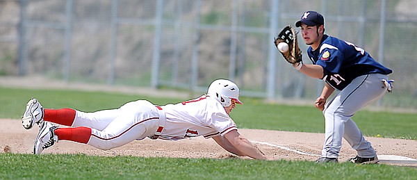 Kalipsell Lakers Mike Bare, 11, makes it safely back to first as Helena Senators firstbaseman Jake Harris, 17, tries to tag him out at the bag during their game on Saturday.