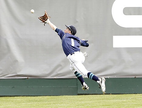 &lt;p&gt;Lake City left fielder Tanner Criswell can't quite get to a Capital hit as Lake City lost to Capital 4-0 in the first round of the state 5A baseball tournament Thursday at Memorial Stadium in Garden City.&lt;/p&gt;