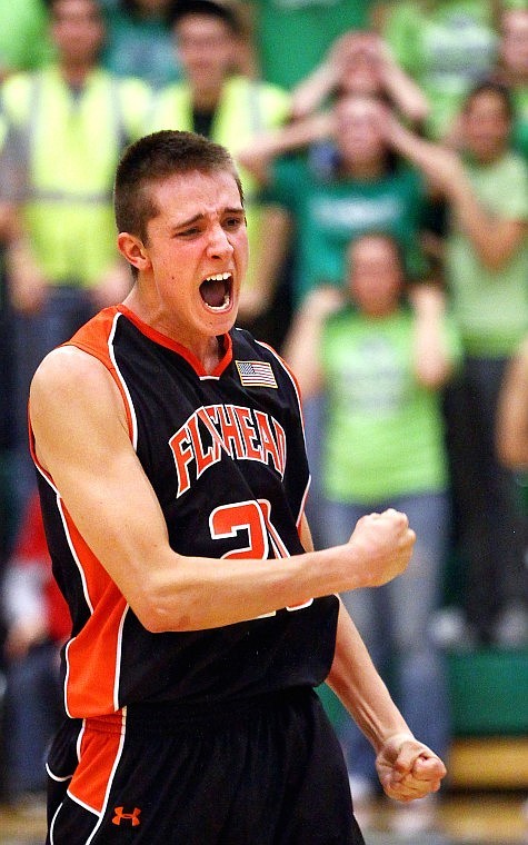 Flathead&#146;s Tanner Salois celebrates his game-tying shot with seconds to go in the fourth quarter of a game against Glacier during February 2010. Flathead pulled away with the win in overtime.