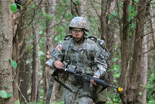 &lt;p&gt;Capt. Sara Rodriguez of the 101st Airborne Division walks through the woods during the expert field medical badge testing at Fort Campbell, Ky., on May 9, 2012. Female soldiers are moving into new jobs in once all-male units as the U.S. Army breaks down formal barriers in recognition of what's already happened in wars in Iraq and Afghanistan. (AP Photo/Kristin M. Hall)&lt;/p&gt;