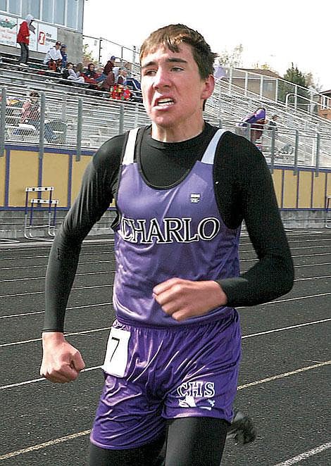 Photo by Ali Bronsdon - Charlo Viking freshman Chance Rosenbaum starts his kick to end the 1600-meters last Thursday in Polson. Rosenbaum won the district title.