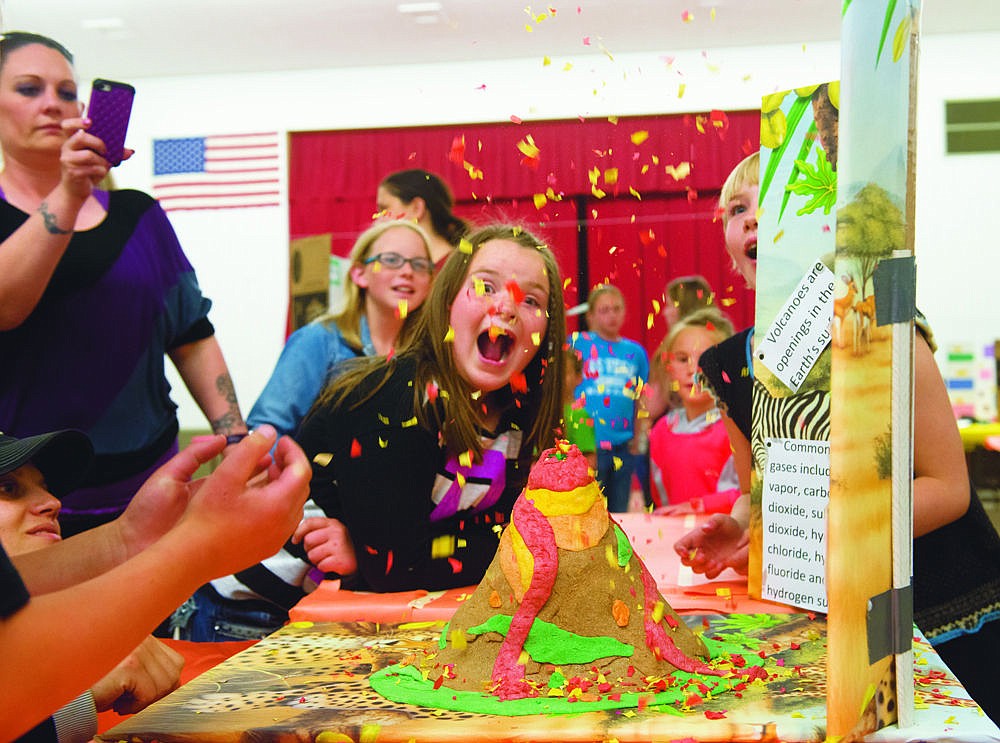 &lt;p&gt;Brooke Jackson, a second grader from Hot Springs elementary school, catches fake lava from her and her partner's, Bella Ilac, science fair project.&lt;/p&gt;