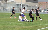 Wahluke wins at district tourney