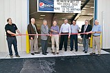Weinstein cuts ribbon on new warehouse
