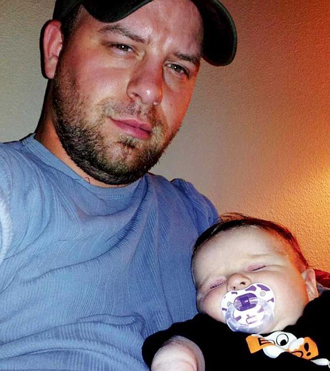 Jonathan Jones, of Moses Lake, pictured with his daughter, was killed after he crashed his motorcycle in Moses Lake Monday.