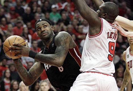 &lt;p&gt;Miami's LeBron James, left, looks to the basket as Chicago's Luol Deng defends during the second quarter in Game 1 of the NBA Eastern Conference finals Sunday in Chicago.&lt;/p&gt;