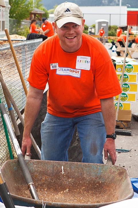 &lt;p&gt;Patrick Cote/Daily Inter Lake Kalispell store manager Jeremy Hancock moves a wheelbarrow Thursday morning during Team Depot Day at Discovery Developmental Center. Thursday, May 17, 2012 in Kalispell, Montana.&lt;/p&gt;