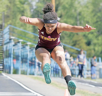 &lt;p&gt;District track meet with Olivia Roach competing in the long jump May 14, 2016.&lt;/p&gt;