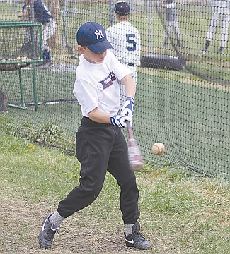 &lt;p&gt;Caden Fitzpatrick puts a charge into one during a hitting drill.&lt;/p&gt;