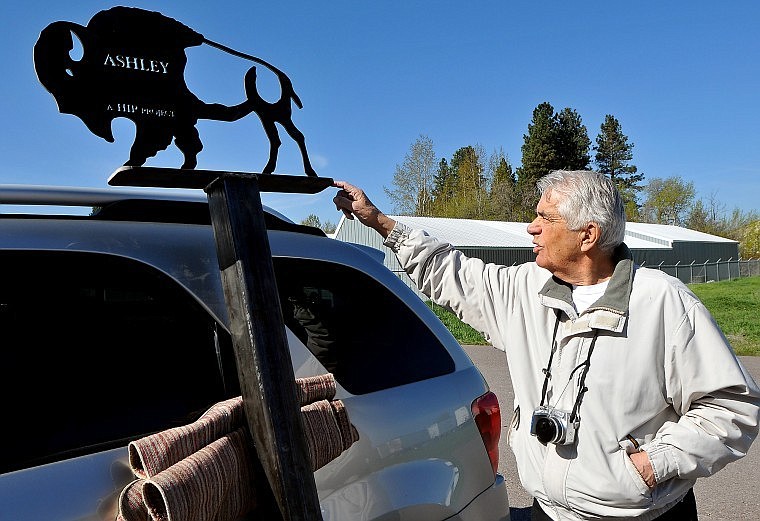 Jerry Murphy, president of History Is Posh, points to a nearly completed bison historical marker created by GlacierJet Technologies in Evergreen. The bison pieces will be used along stops on the history group's new Lower Valley Driving Tour.