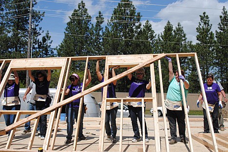 &lt;p&gt;A group teams up to raise a wall of a habitat for Humanity home in Coeur d'Alene during Women Build Week. From Left, Kitty Krier, Sue Ball, Kris Owens, Lisa Brown, Debbi Long, Jenniger Kenefick and Pam Rogness.&lt;/p&gt;