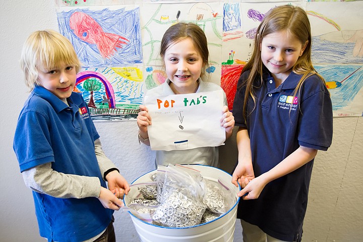 &lt;p&gt;SHAWN GUST/Press Sorenson Magnet School third-graders Gunnar Nickerson, Cassie Krajack, and Makenzie Hanes, right, organized a pop tab drive that collected about 5,000 tabs since October that, once recycled, will help raise money for the Ronald McDonald House. The project, spearheaded by Nickerson, is in its second year.&lt;/p&gt;