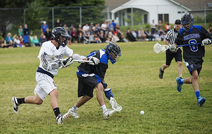 &lt;p&gt;LOREN BENOIT/Press Coeur d'Alene beats Lake City, 12-11, in Idaho's Lacrosse League Division II quarterfinal tournament game Wednesday, May 18, 2016 at Lake City High School.&lt;/p&gt;