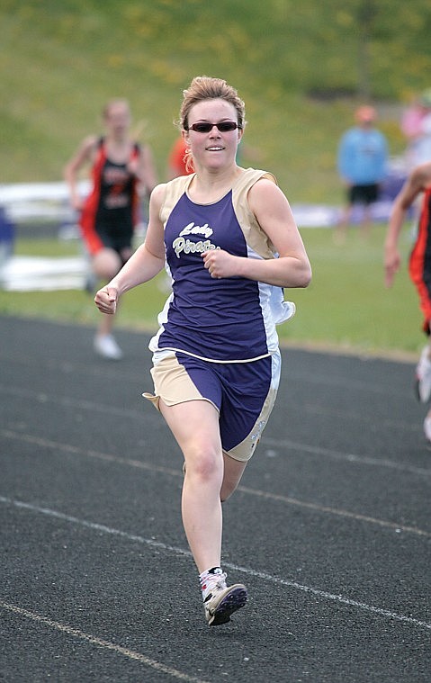 Senior Geri Sylvester runs to a fifth place finish and personal best time in the 400-meter dash at Saturday's Nelson/Thomas ABC meet in Polson.