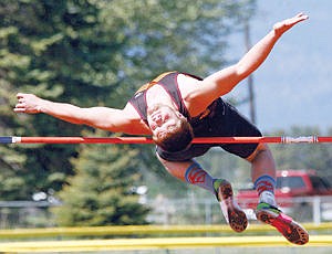 <p>Troy senior Sean Opland clears 6 feet 4 inches in the high jump at the district track meet hosted by Eureka May 9.</p>