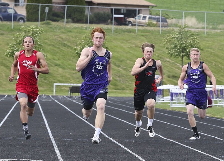 &lt;p&gt;Arlee's Isaac Desjarlais, Charlo's Michael Delaney, Hot Springs' Trevor Paro and Charlo's Jared Doty run the 100-meter dash at the district track meet on Thursday.&lt;/p&gt;