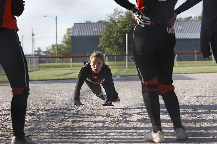 &lt;p&gt;Ronan's Jordyn Clairmont takes a final slide into home base after the Maidens' senior night against Thompson Falls.&lt;/p&gt;