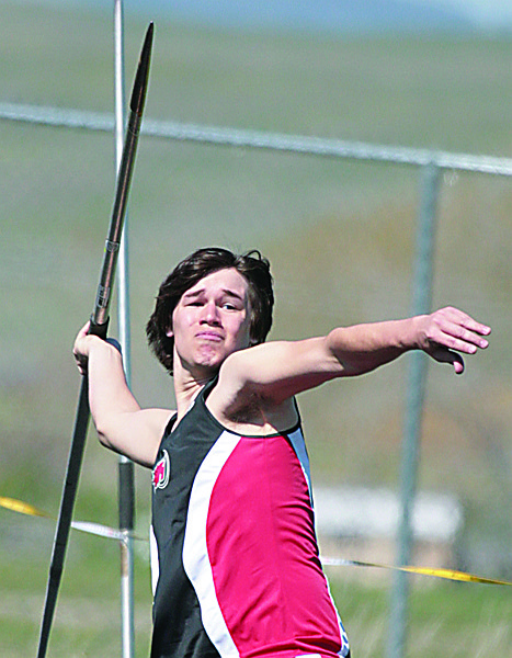 Tyler Fisher throws the javelin at the District Meet in Polson.