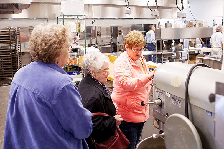 &lt;p&gt;Former kitchen workers look at an old mixing machine, one of the few pieces of equipment that was brought from the old kitchen. May 13, 2014 in Kalispell, Montana. (Patrick Cote/Daily Inter Lake)&lt;/p&gt;