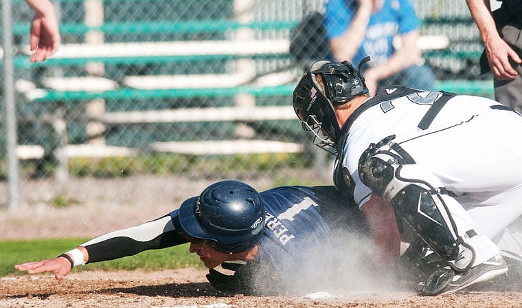 &lt;p&gt;Glacier catcher Dakota Birdwell (right) tags out a Kootenai Valley runner at the plate Wednesday night during the Glacier Twins victory over Kootenai Valley at Memorial Field in Whitefish. May 14, 2014 in Whitefish, Montana. (Patrick Cote/Daily Inter Lake)&lt;/p&gt;