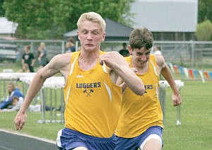 &lt;p&gt;Stetson Enyeart, left, and Brian Peck 100-meter dash. Divisionals track May 16.&lt;/p&gt;