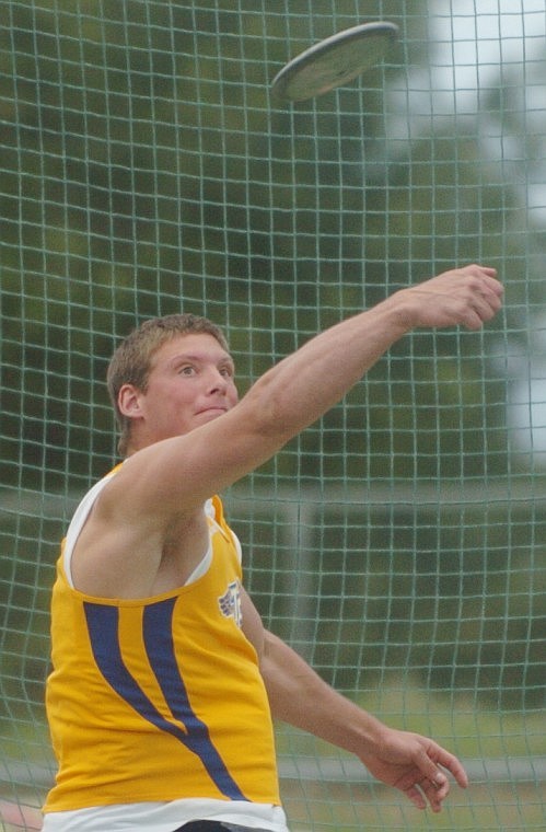 Mike Wood throws the discus at the District Track Meet in Bigfork.