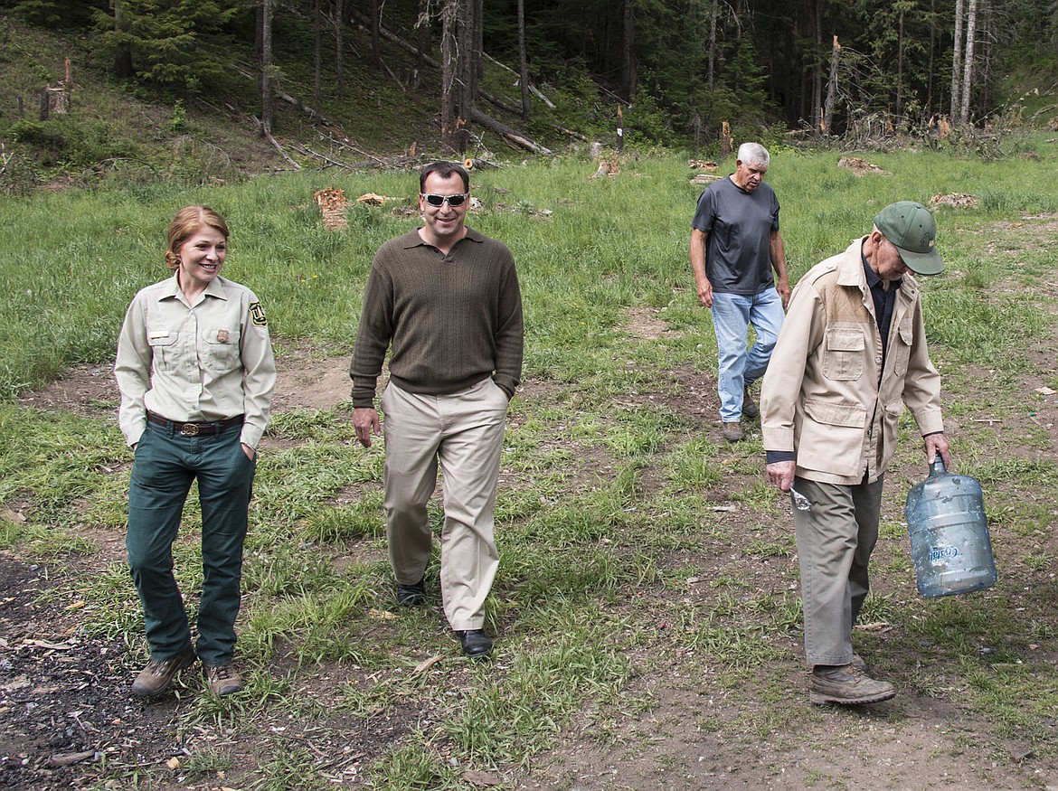 &lt;p&gt;From left to right, Shoshana Cooper, Brian Bunch, Dale Bunch and Bob Balser leave one of the Hayden Creek areas that has been trashed and damaged. A lot of the trees have been shot down and only remain as stumps and paper plates, cigarettes and shell casings litter the ground. These four have been working together for the past five years to keep this area clean.&lt;/p&gt;