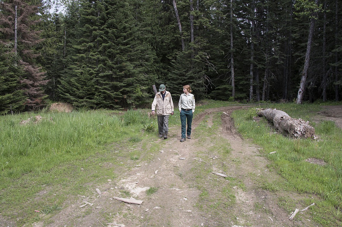 &lt;p&gt;Bob Balser and Shoshana Cooper explore &#147;the shooting range&#148; near Hayden Creek where people have been leaving lots of trash and big gouges in the roads. Balser has been working withe the U.S. Forest Service for five years to clean up the area.&lt;/p&gt;