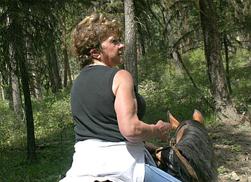 &lt;p&gt;Tracy Caldwell rides Banjo during a recent leisurely ride off Upper Lynch Creek Road near Plains.&lt;/p&gt;