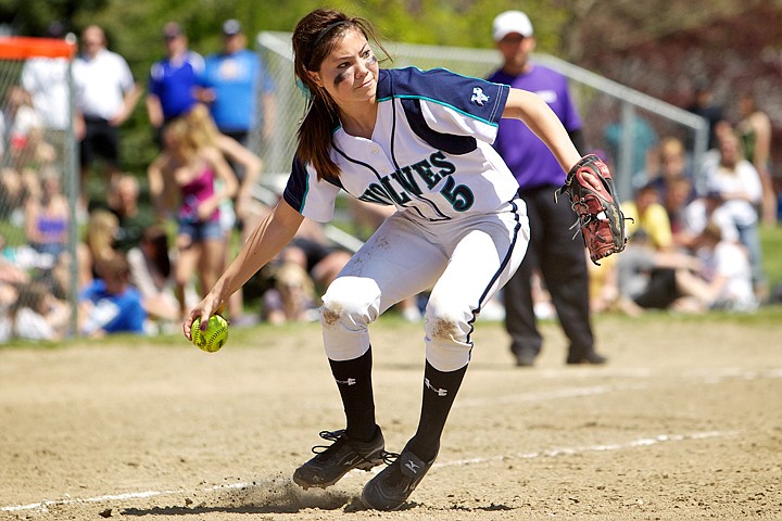 &lt;p&gt;Lake City High's Hailey Jackson keeps her eye on a Rocky Mountain High player after chasing down a bunt along the third base line.&lt;/p&gt;