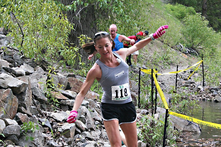 &lt;p&gt;Trisha Drobeck rounds the last curve towards the finish line during the annual 11 Miles to Paradise race.&#160;&lt;/p&gt;