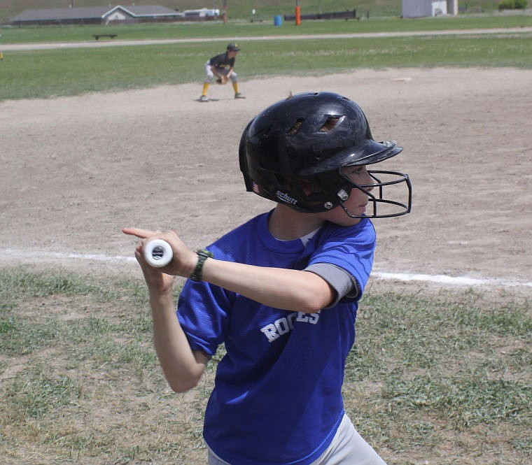 <p>A Superior Rockies baseball player lines up to bat against Plains. </p>