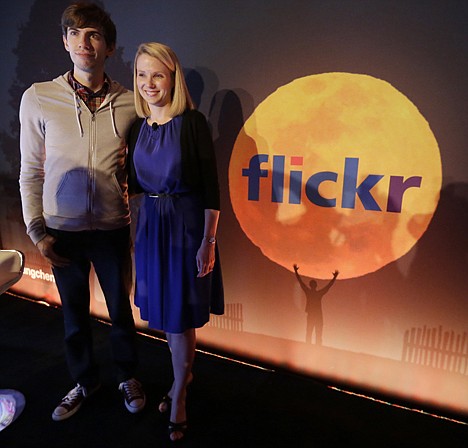 &lt;p&gt;Yahoo CEO Marissa Mayer, right, and Tumblr Chief Executive David Karp pose for photographs after a news conference Monday, in New York. Yahoo edged up 31 cents, or 1.2 percent, to $26.83 after the Internet company said it was buying online blogging forum Tumblr for $1.1 billion.&lt;/p&gt;