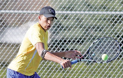 &lt;p&gt;Libby's Jhamaal Sykes lines up a return in this April 12, 2016 file photo. Sykes finished sixth at the Class B-C state tournament, helping Libby win its first team tennis championship in school history. (Paul Sievers/Western News)&lt;/p&gt;