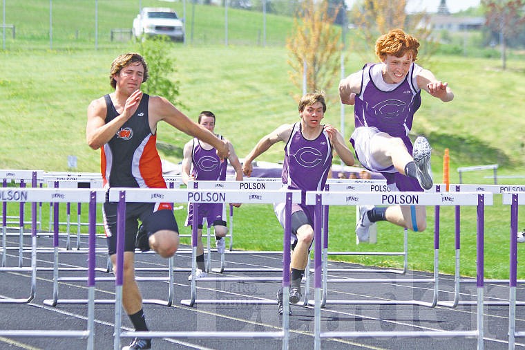 &lt;p&gt;Charlo's Kail Pope (right) clears the last hurdle and looks toward the finish line, which he crossed just ahead of Hot Springs' Tanner Hoff to win the 110-meter hurdles at Thursday's District 14C track meet in Polson.&lt;/p&gt;