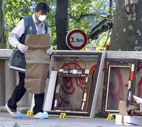 &lt;p&gt;Police officers search for clues as they pack up the frames of the stolen paintings outside the Paris Museum of Modern Art, following the report of five paintings having been stolen, Thursday May 20, 2010. Police and prosecutors say a lone thief has stolen five paintings worth a total of Euros 500 million ($613 million), including works by Picasso and Matisse and Modigliani. (AP Photo/Jacques Brinon)&lt;/p&gt;