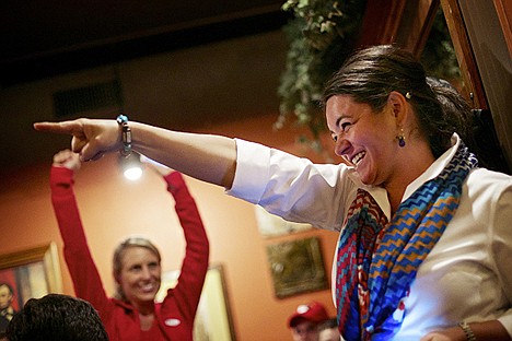 &lt;p&gt;Christa Hazel points toward her supporters at the Fort Ground Grill after reading the unofficial results to Tuesday's election for the Coeur d'Alene School District board of trustees seat for zone 1 which showed her winning with 63 percent of the votes.&lt;/p&gt;