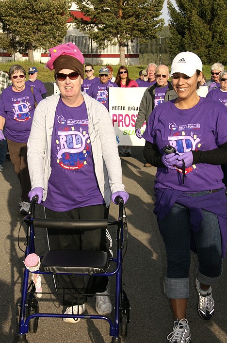 &lt;p&gt;Susan Hilditch, left, and Kelsi Cruse walk the survivor's lap together.&lt;/p&gt;