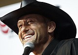 Country star kicks label to the curb